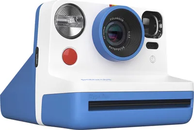 A white and blue Polaroid instant camera is shown against a white background.