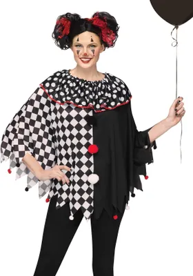 A woman wearing a clown costume and holding a balloon.