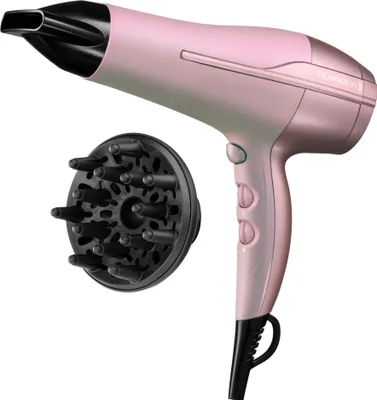 A pink Remington hair dryer with a black diffuser attachment is shown against a white background.