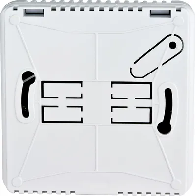 The back of a white digital thermostat.