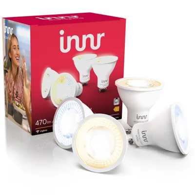 A product shot of Innr smart light bulbs and their packaging.