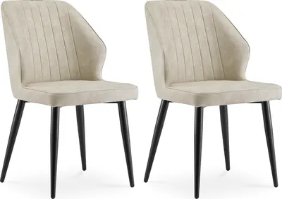 Two beige dining chairs with black legs are shown against a white background.