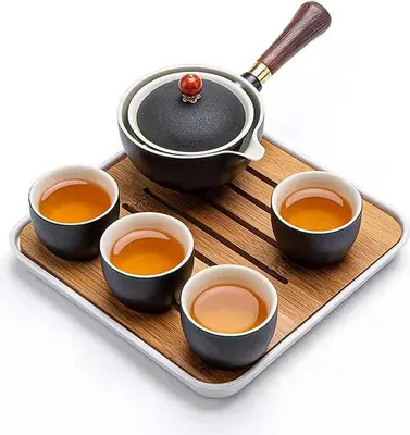 Zdjęcie produktu dla Ceramiczny przenośny zestaw do herbaty Kungfu Tea Set, czajniczek obracany o 360 stopni, 4 filiżanki, taca, torba podróżna