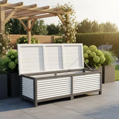 An outdoor storage chest is shown open on a patio, with plants and a pergola in the background.