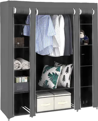 A fabric wardrobe with clothes and storage boxes inside.