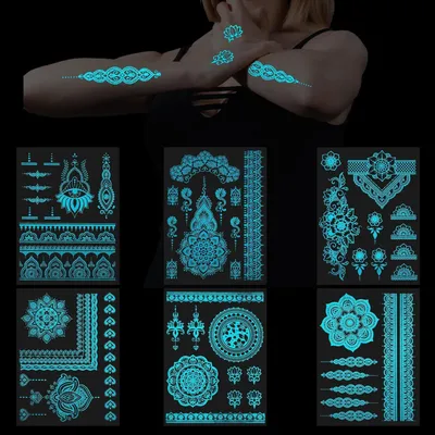 Productafbeelding van Tijdelijke Tatoeages - Lichtgevende Tattoos - Feestelijke Decoratie - Glow-in-the-dark - 6 vellen - Blauw