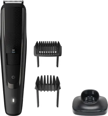 A black Philips S5000 beard trimmer with accessories on a white background.