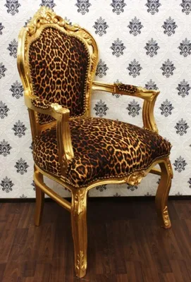 Produktbild von Casa Padrino Barock Esszimmer Stuhl Leopard / Gold mit Armlehnen