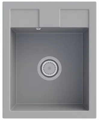 A top-down view of a gray kitchen sink with a drain.