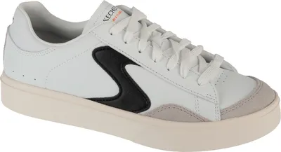 A white sneaker with black and gray accents is shown against a white background.