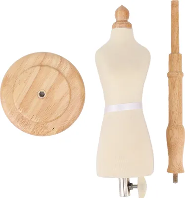 A display of a female dress form with its base and pole.