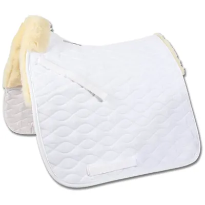 A white quilted saddle pad with cream-colored sheepskin trim.