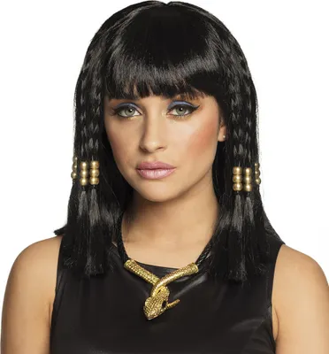 A woman wearing a Cleopatra-style wig and costume, including a snake necklace.