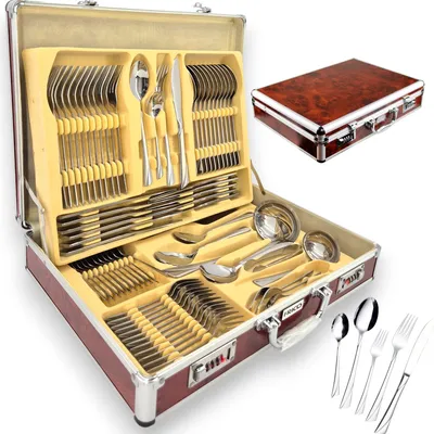 A cutlery set in an open case, with a closed case shown in the background.