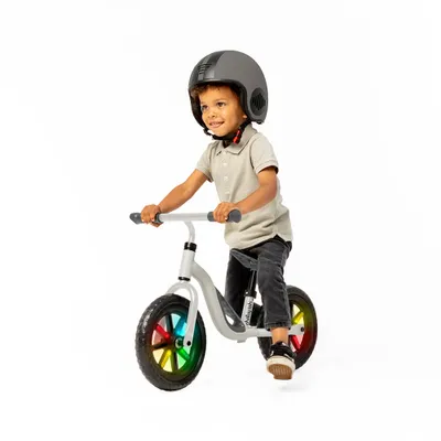 Produktbild von Chillafish Charlie 10" līdzsvara velosipēds, bēšs, ar gaismiņām no 1,5 līdz 4 gadiem