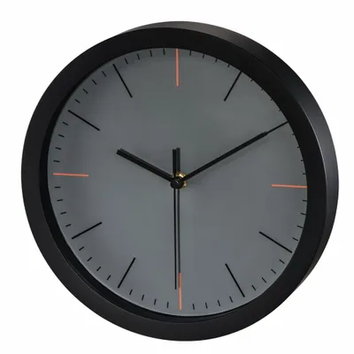 A close-up, studio shot of a wall clock against a white background.