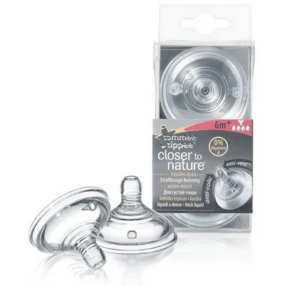A product shot of Tommee Tippee Closer to Nature baby bottle nipples in packaging, with two nipples shown outside the packaging.