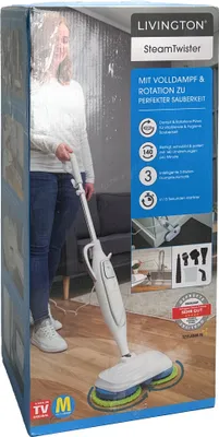 The image shows the packaging of a steam mop, with a woman using the product in the background.
