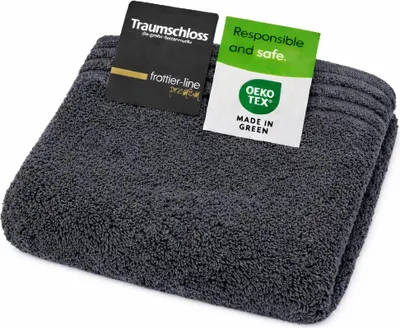 A folded dark gray towel with two tags attached to it.