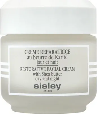 A close-up studio shot of a Sisley restorative facial cream jar.