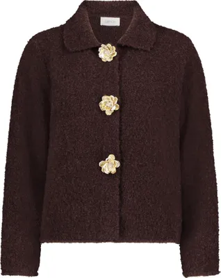 A brown cardigan with gold flower-shaped buttons.