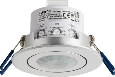 A motion sensor light fixture with adjustable settings.