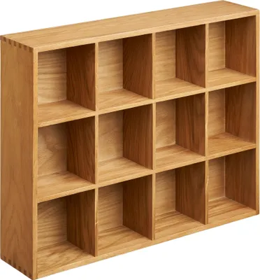 A wooden shelf unit with multiple compartments.
