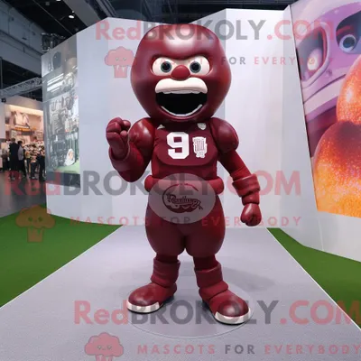 Produktbild von Kastanienbraunes REDBROKOLY Maskottchenkostüm mit American Football-Helm bekleidet mit einem A-Linien-Kleid und Fußpolstern