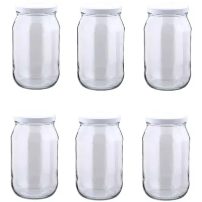 Six empty glass jars with white lids are arranged in two rows of three.