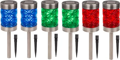 Six solar garden lights with blue, green, and red glass globes and silver metal bases, each with a black ground stake.