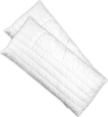 Two white pillows are shown diagonally on a white background.