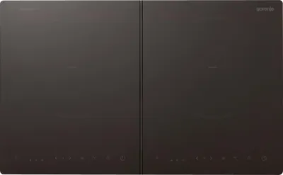 A top-down view of a black induction cooktop with two heating zones.