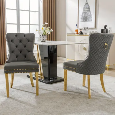Image de Ensemble de 2 chaises de salle à manger - Chaises grises élégantes avec des détails dorés et des pieds en acier inoxydable