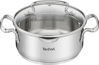 A stainless steel pot with a glass lid and two handles, shown from a front-side angle against a white background.