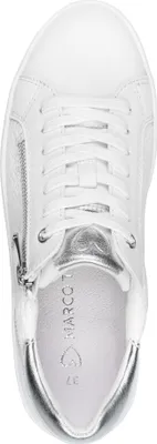 A top-down view of a white sneaker with silver accents.