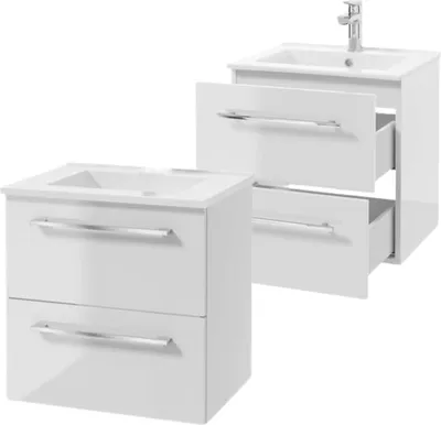 Two white bathroom cabinets with sinks and faucets, one with drawers open.