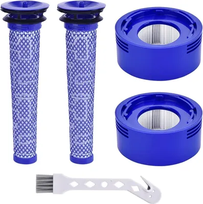 A set of vacuum cleaner filters and a cleaning brush are displayed against a white background.