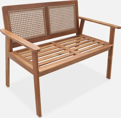 A wooden outdoor bench with a rattan-woven backrest, shown against a plain white background.
