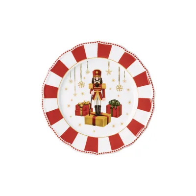 A Christmas-themed plate featuring a nutcracker figure and gift boxes.