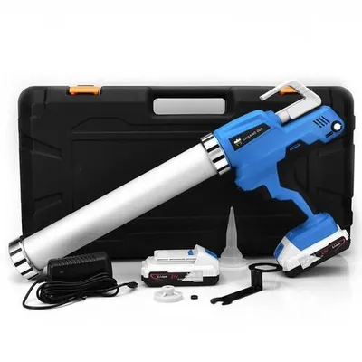 A cordless caulking gun set is laid out on a white background, with its accessories and carrying case.