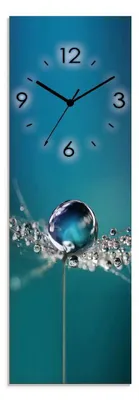 A close-up of a clock face with a water droplet on a dandelion seed.
