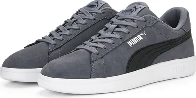 A pair of Puma sneakers on a white background.