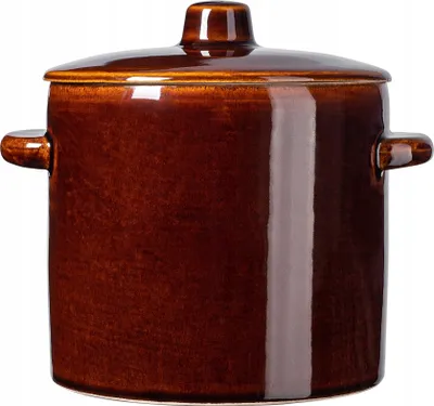 A brown ceramic pot with a lid and handles, shown against a white background.