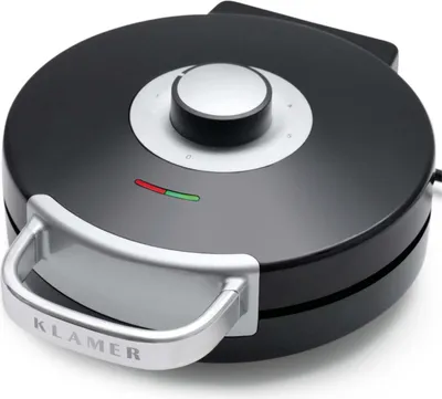 A black and silver waffle maker is shown from a slightly elevated angle against a white background.