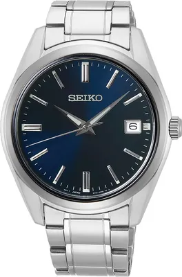 A close-up studio shot of a men's wristwatch with a blue dial and silver metal band.