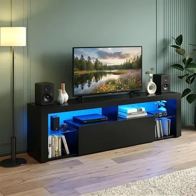 Imagen del producto de Mueble de TV  con iluminación, mueble bajo para TV de 140 cm de largo con estantes de vidrio y un cajón. Mueble para televisores de hasta 55 pulgadas, ideal para salón o dormitorio. Dimensiones: 140 x 35 x 50 cm