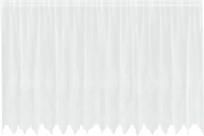A white lace curtain with a floral pattern along the bottom edge, hanging in vertical pleats.