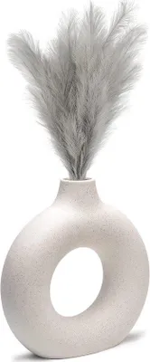 Produktbild von Unyqoos® Donut-Vase aus mattem Porzellan – skandinavische Ringvase für Pampasgras, weiß/beige, Größen S/M/L (S 13,5×14 cm, Ø 2,5 cm; M 18×19 cm, Ø 3,4 cm; L 22,5×23 cm, Ø 4 cm)