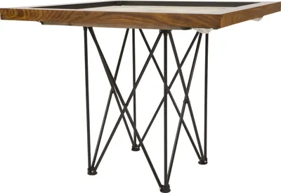 A carrom board table with a wooden top and black metal legs, shown from a three-quarter angle.