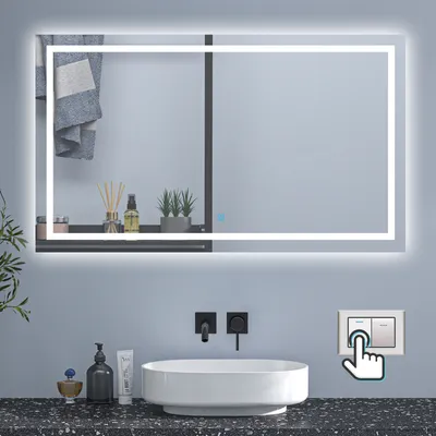 A modern bathroom scene featuring a lighted mirror above a sink, with a hand icon pointing to a switch.